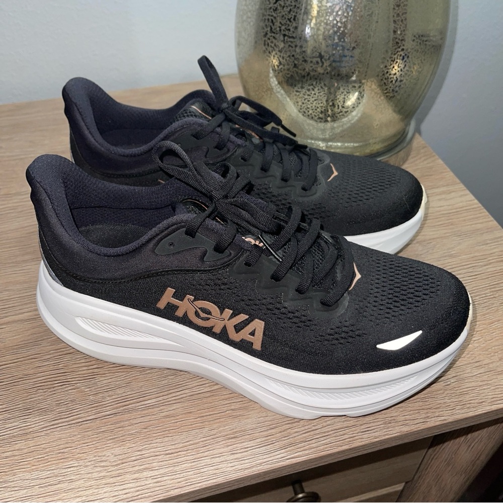 Hoka Bondi  Women’s Black Running Shoes with Rose Metallic Logo